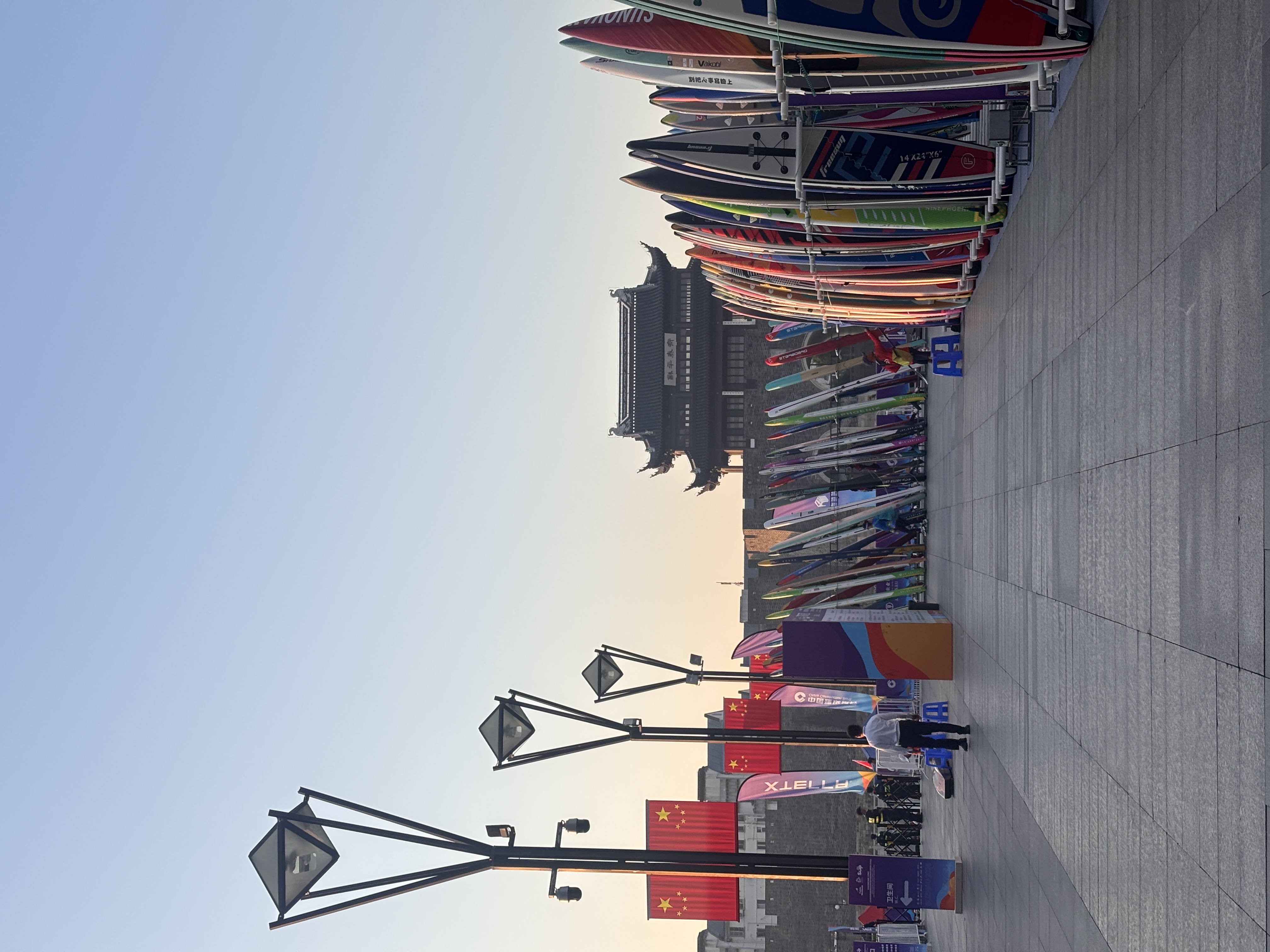 Board racks beside the old-city architecture